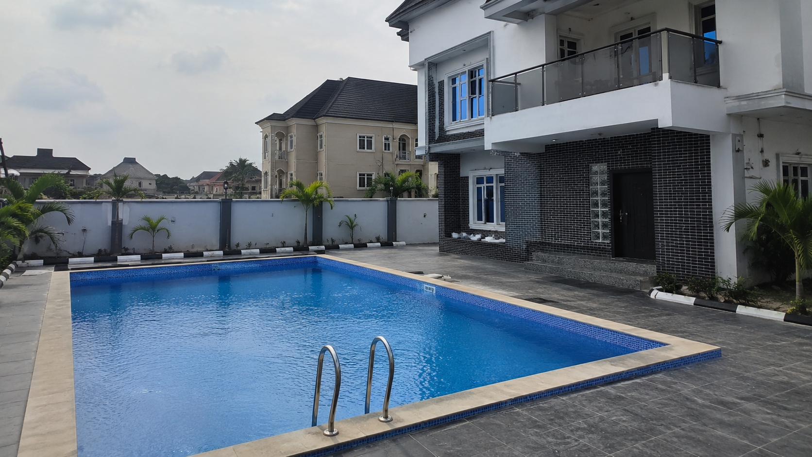 Completed residential swimming pool and deck